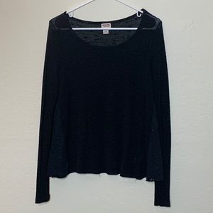 Sheer black women’s blouse with detail